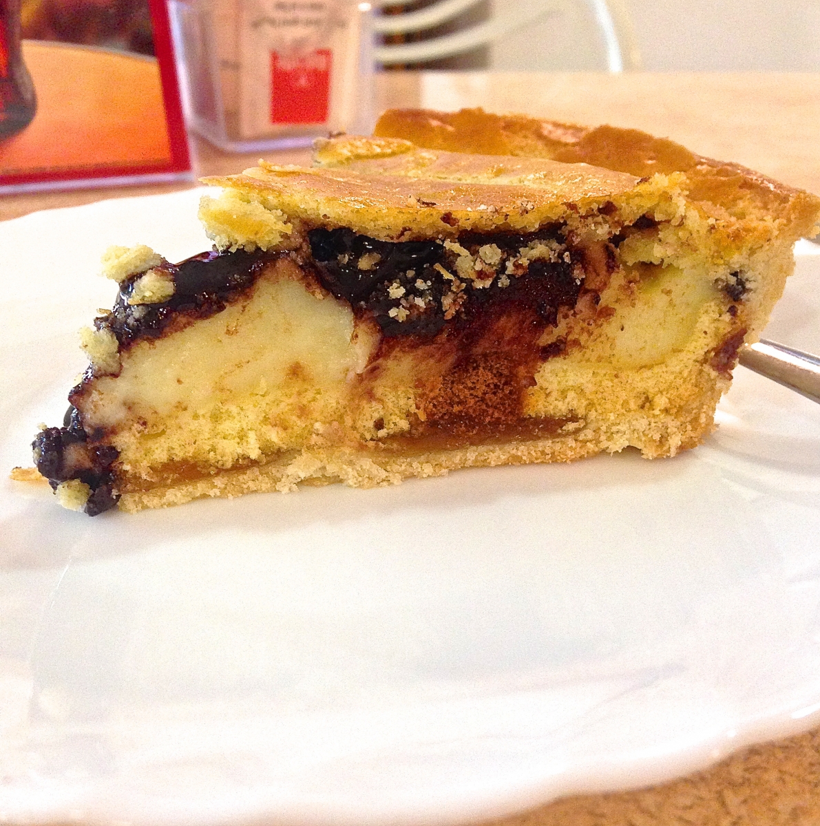 Torta Monterossina:  One dessert that is essential to try in Monterosso al Mar is the torta monterossina.  This pie has three layers of chocolate pudding, cream and apricot jam all inside of a flaky crust.   Try a sample at an authentic bakery called Pasticceria Laura.    